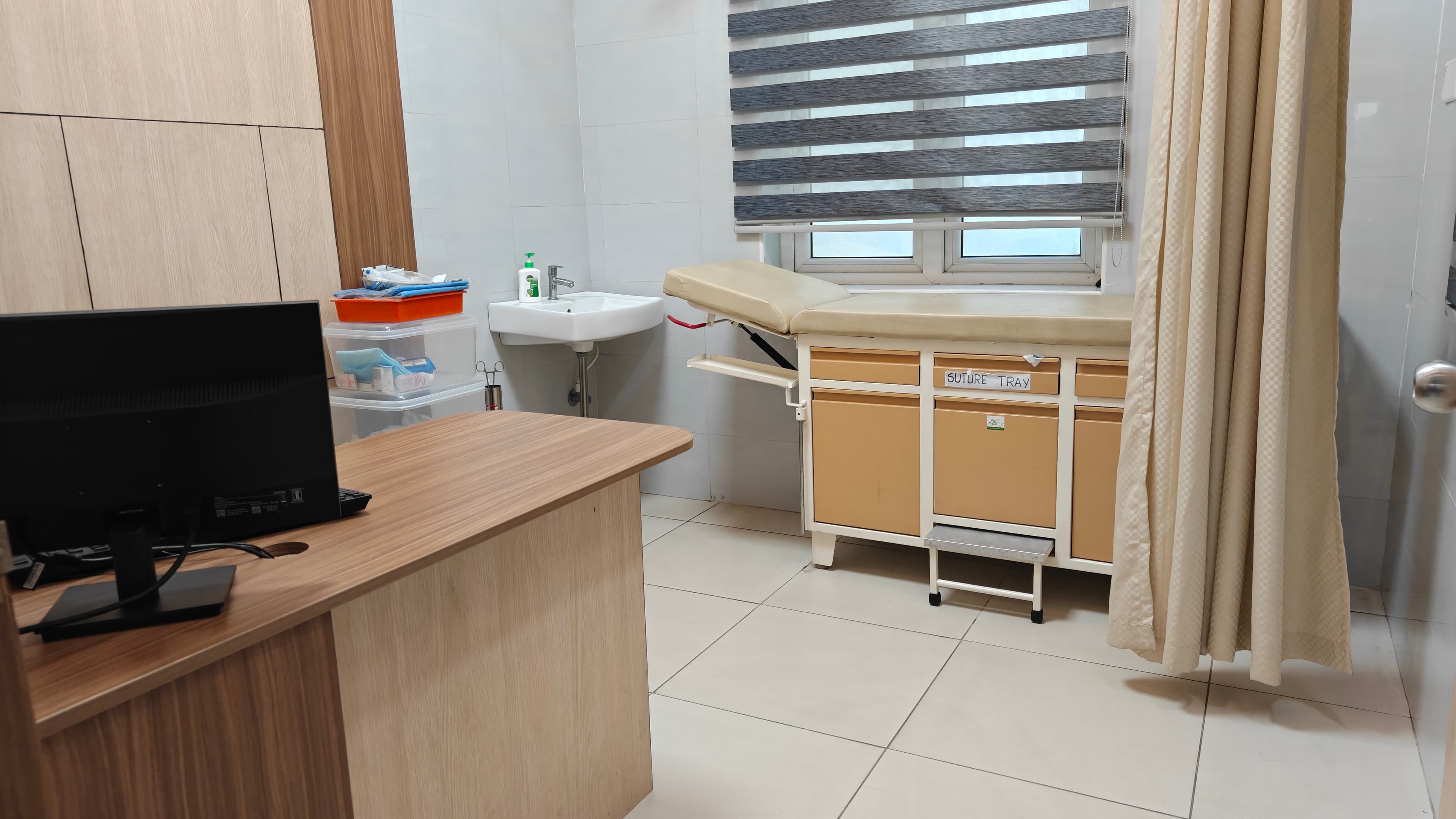 AJSMC consultation room with examination table