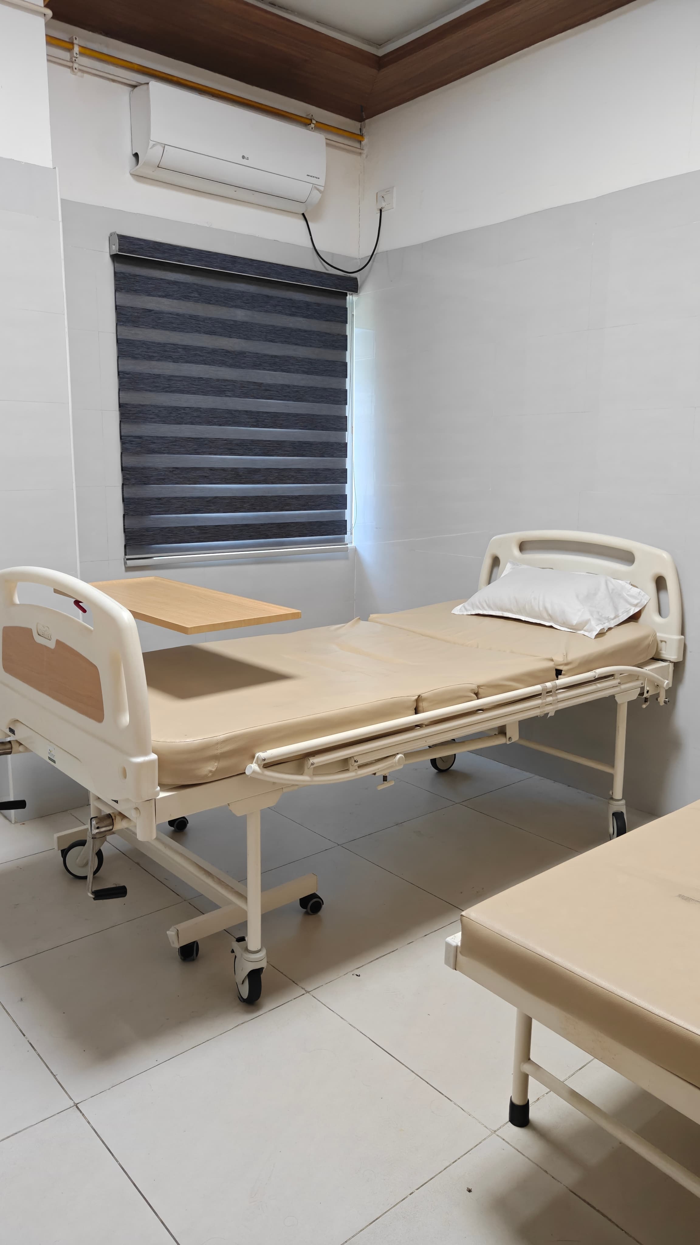 AJSMC private inpatient ward with bed